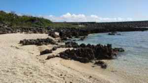 White Coral beach, Turquoise water, rocks